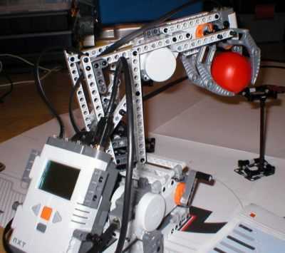 Mindstorms NXT Robot Arm Holding the Red Ball