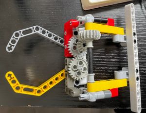 Lego grab and lift mechanism