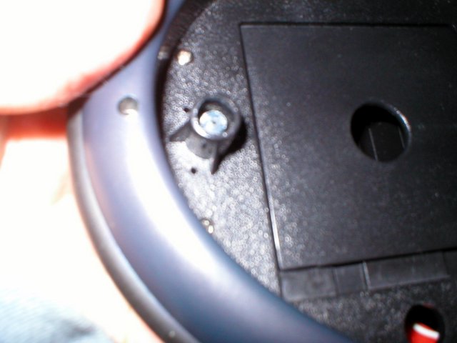 Close up of the broken caster pin in Cybot