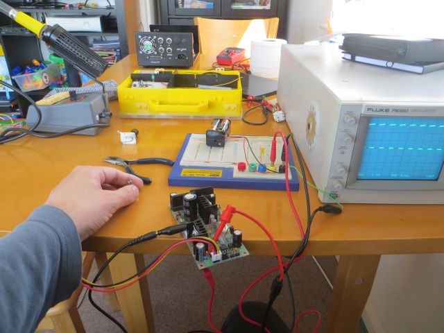 Holding the pot to get the clear Oscilloscope trace from CNC power board